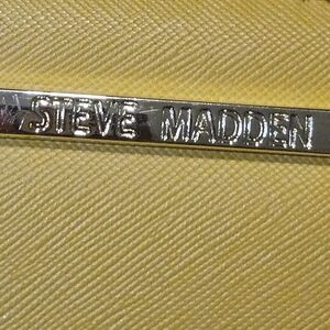 Steve Madden wallet/wristlet. Mustard Yellow with black inside. EUC w8.5"X 5"h